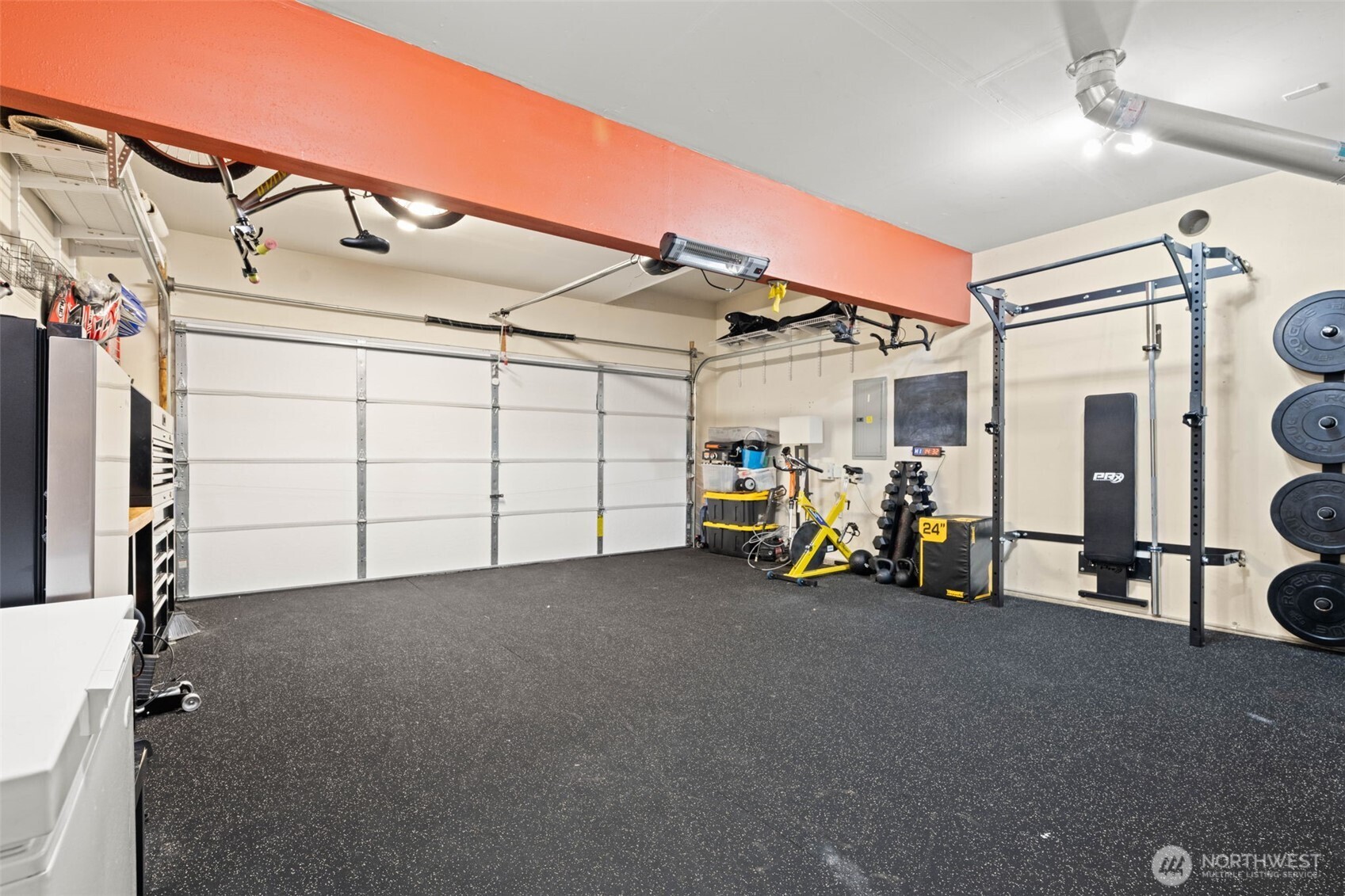 19312 1st Avenue West, Unit 4 Bothell, WA 98012 - Photo 30 of 32 a view of a garage with rack and bicycle