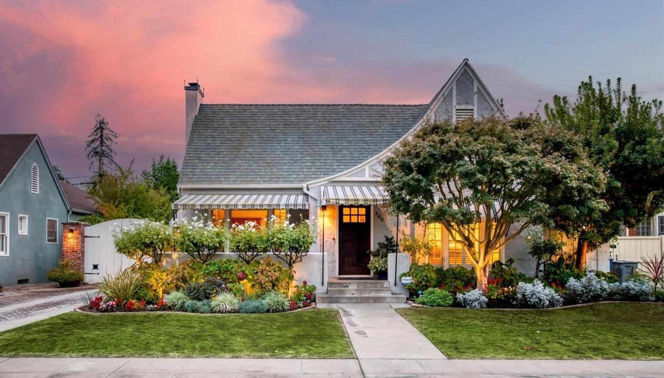 560 East Clinton Avenue Fresno, CA 93704 - Photo 1 of 49 a front view of a house with garden