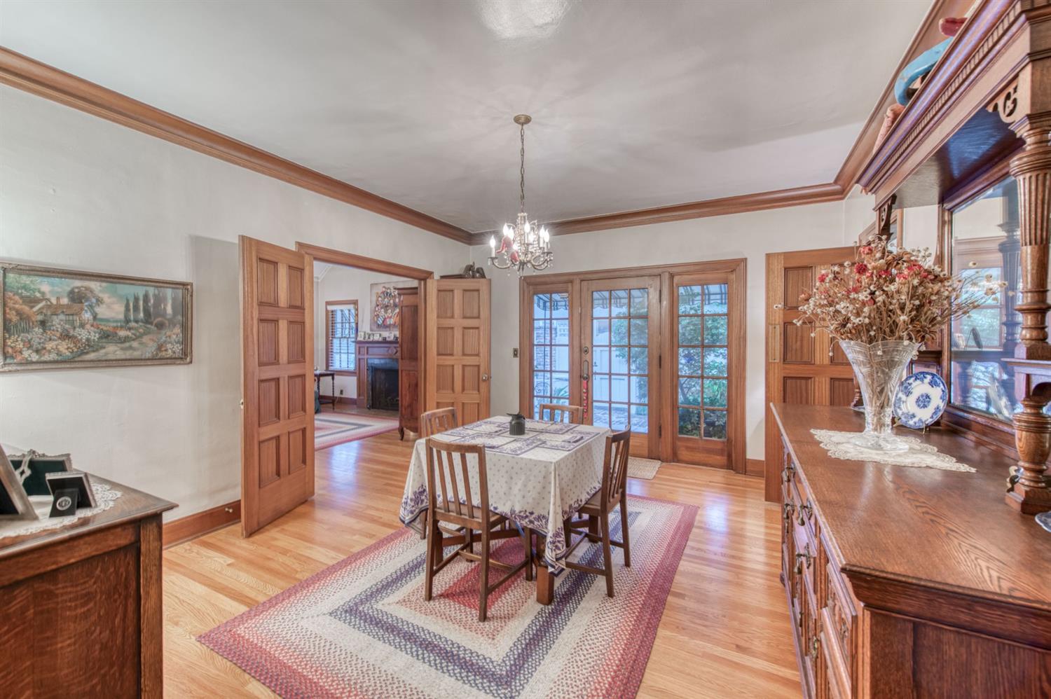 560 East Clinton Avenue Fresno, CA 93704 - Photo 12 of 49 a view of a dining room with furniture window and wooden floor