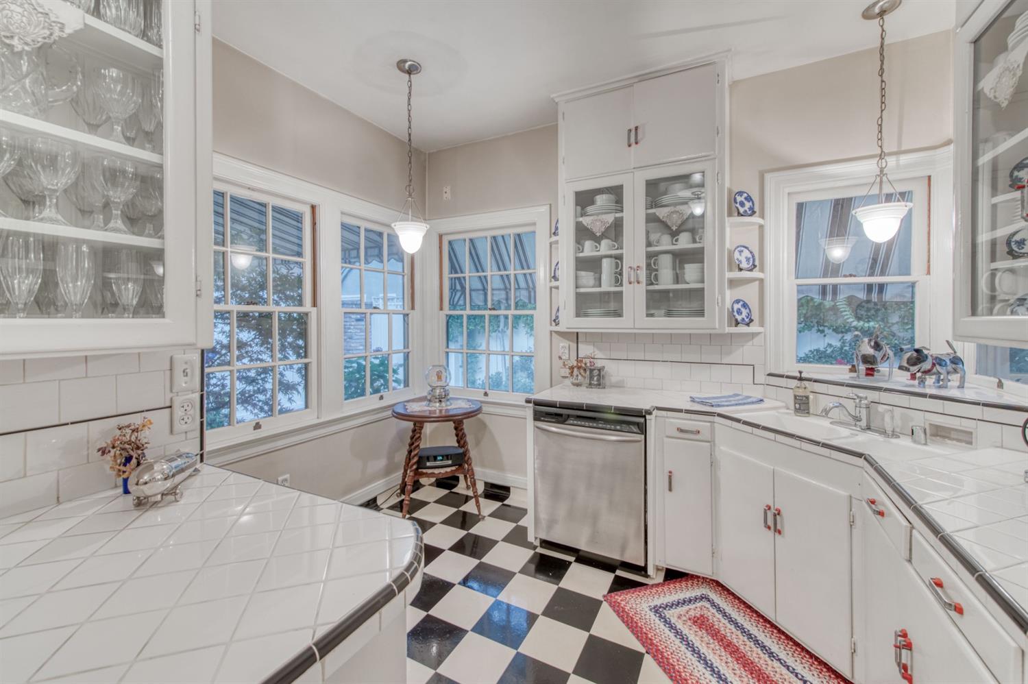 560 East Clinton Avenue Fresno, CA 93704 - Photo 15 of 49 a large white kitchen with granite countertop a sink and a stove