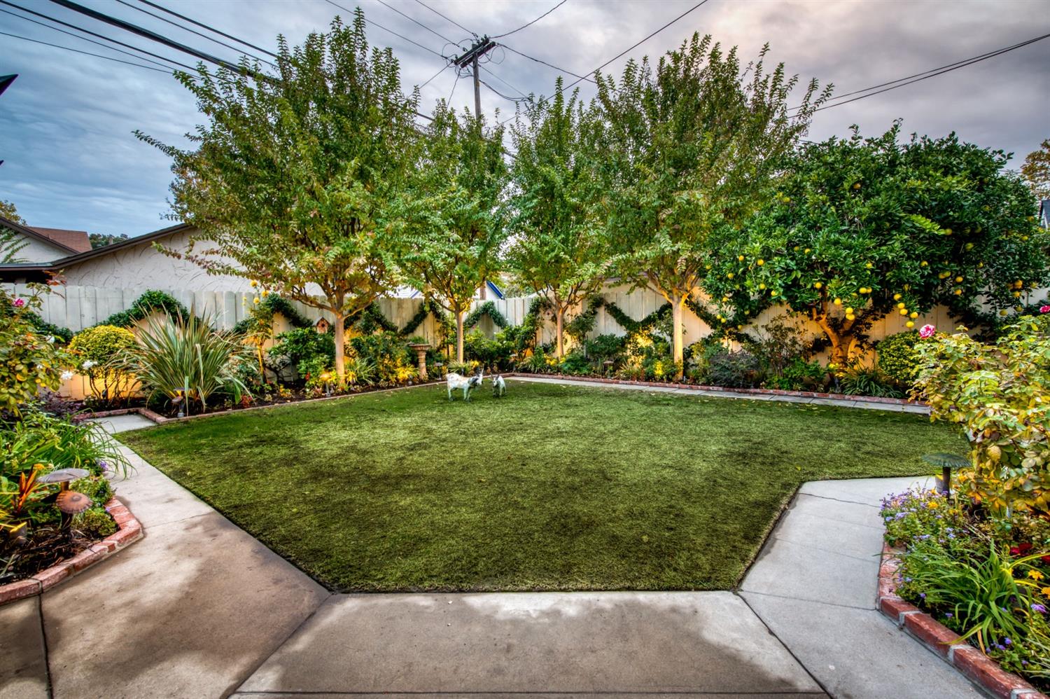 560 East Clinton Avenue Fresno, CA 93704 - Photo 36 of 49 a view of a back yard of the house