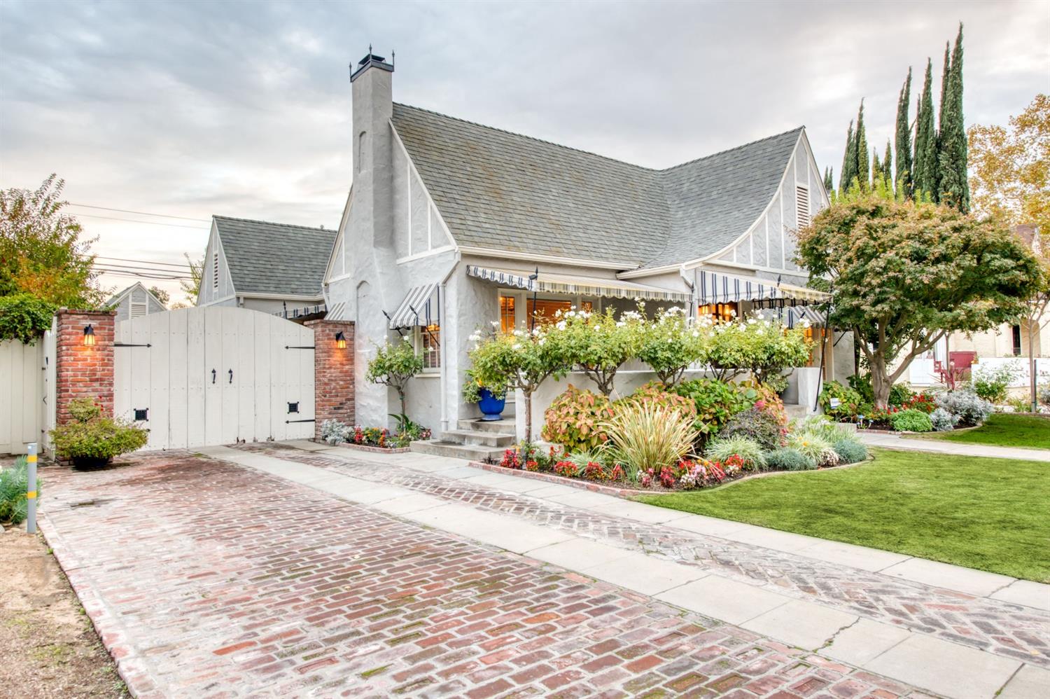 560 East Clinton Avenue Fresno, CA 93704 - Photo 46 of 49 a front view of a house with garden