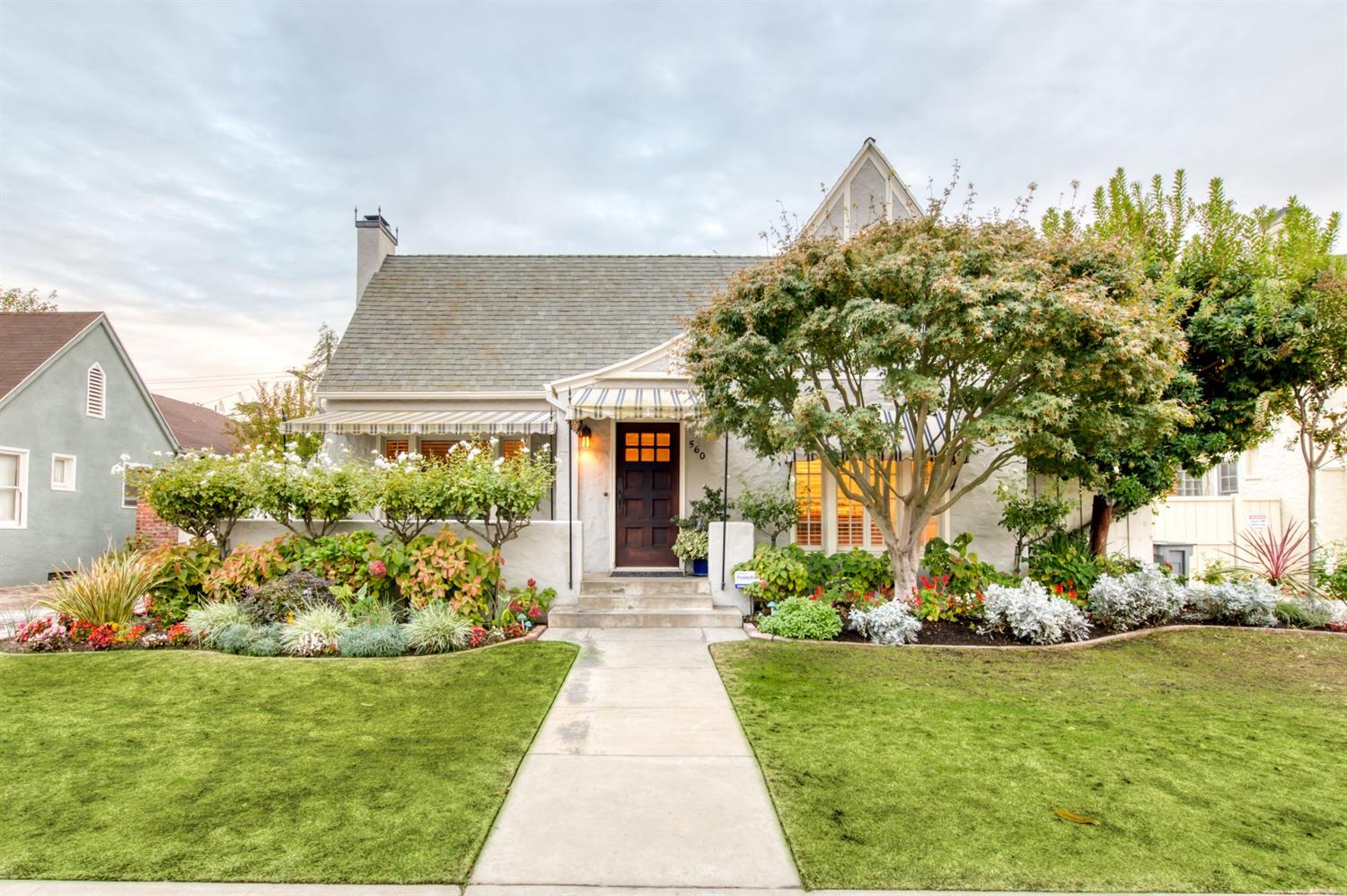 560 East Clinton Avenue Fresno, CA 93704 - Photo 49 of 49 a front view of a house with garden