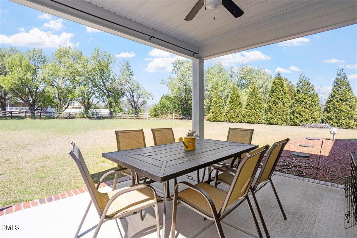 1001 Bellewood Farms Road Raleigh, NC 27603 - Photo 10 of 39 a view of an outdoor space with furniture and garden