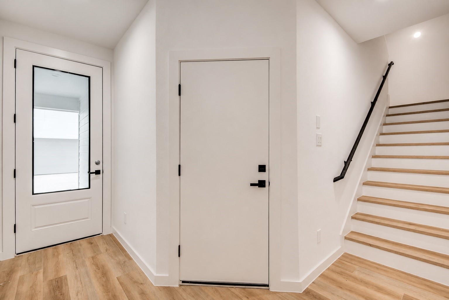 6742 Peerless Street, Unit B Houston, TX 77021 - Photo 2 of 32 Direct garage access leading into the home and thoughtfully designed stair placement provides an easy transition to the open concept living spaces on the second floor.