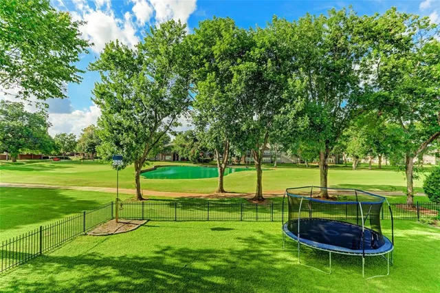 a view of a backyard with a slide