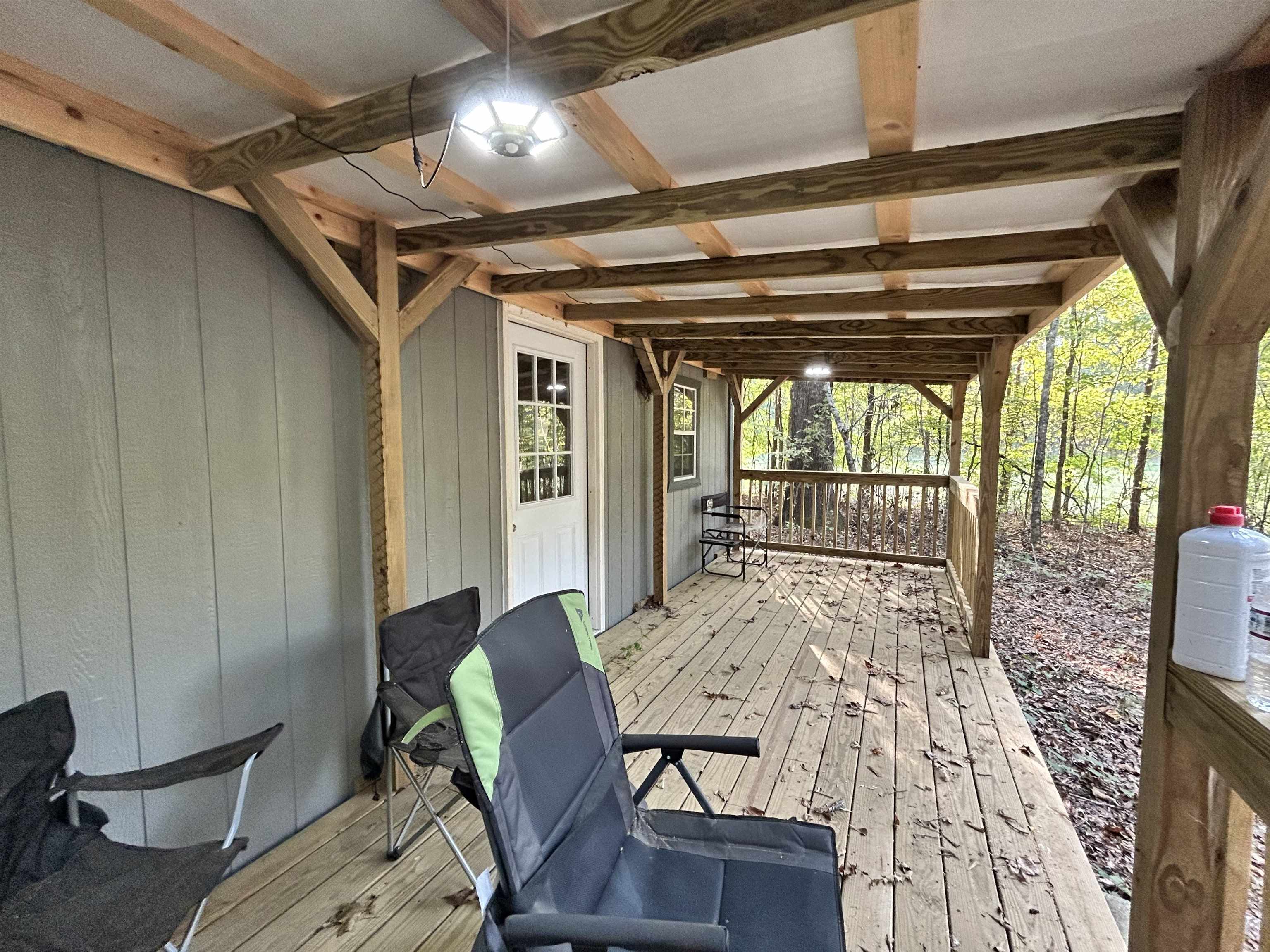 0 Cora Lane Bolivar, TN 38008 - Photo 13 of 24 a view of a dining room with furniture wooden floor and windows