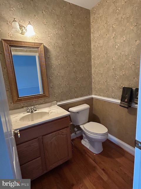 39 Riverside Drive Elkton, MD 21921 - Photo 20 of 64 a bathroom with a toilet a sink and mirror