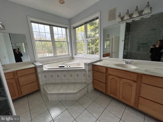 39 Riverside Drive Elkton, MD 21921 - Photo 39 of 64 a spacious bathroom with a tub sink and mirror