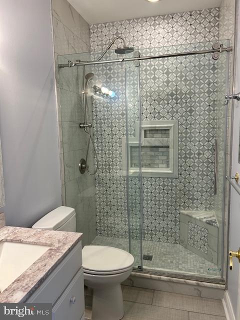 39 Riverside Drive Elkton, MD 21921 - Photo 48 of 64 a bathroom with a granite countertop toilet a sink and shower