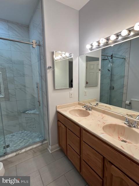 39 Riverside Drive Elkton, MD 21921 - Photo 50 of 64 a bathroom with a shower sink and mirror
