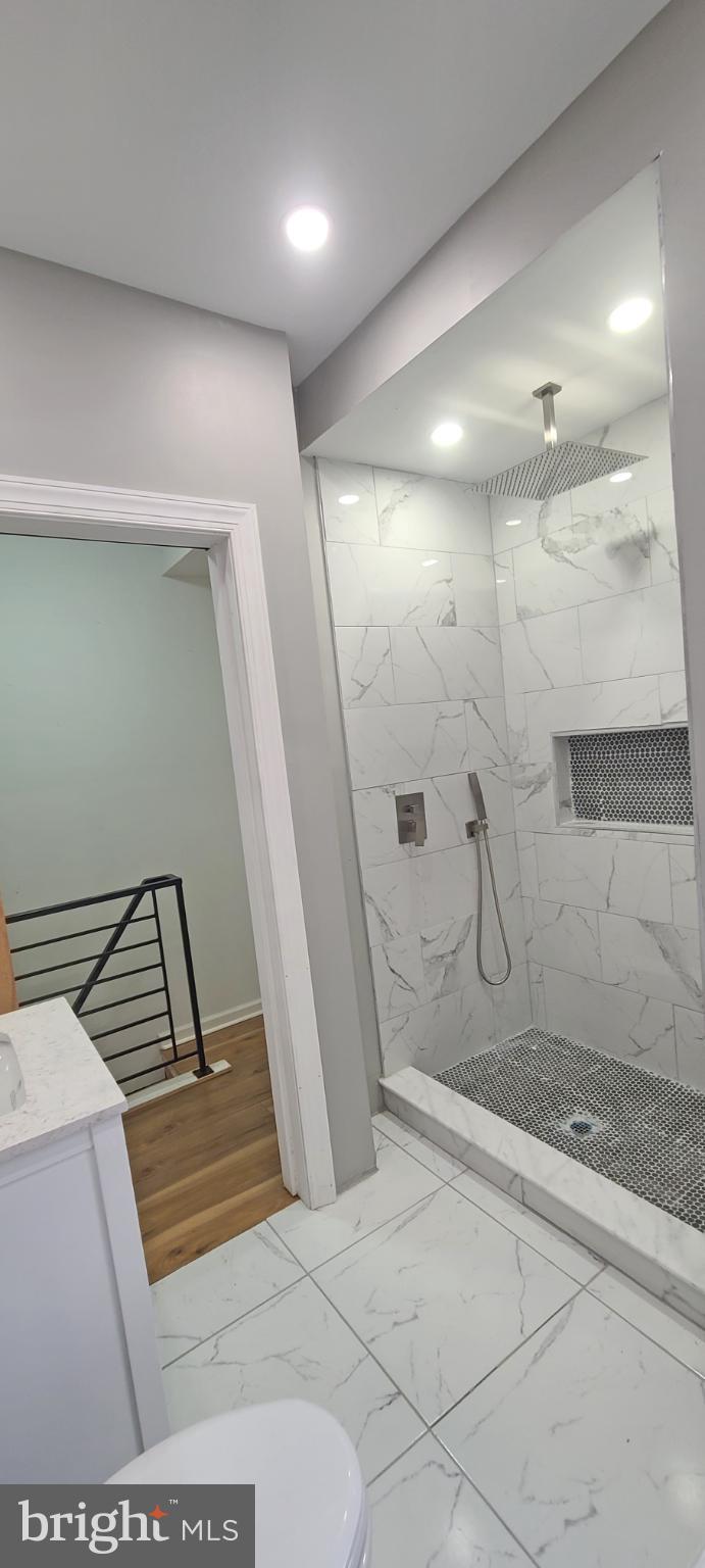 1817 North 26th Street Philadelphia, PA 19121 - Photo 20 of 25 a bathroom with a shower and a sink