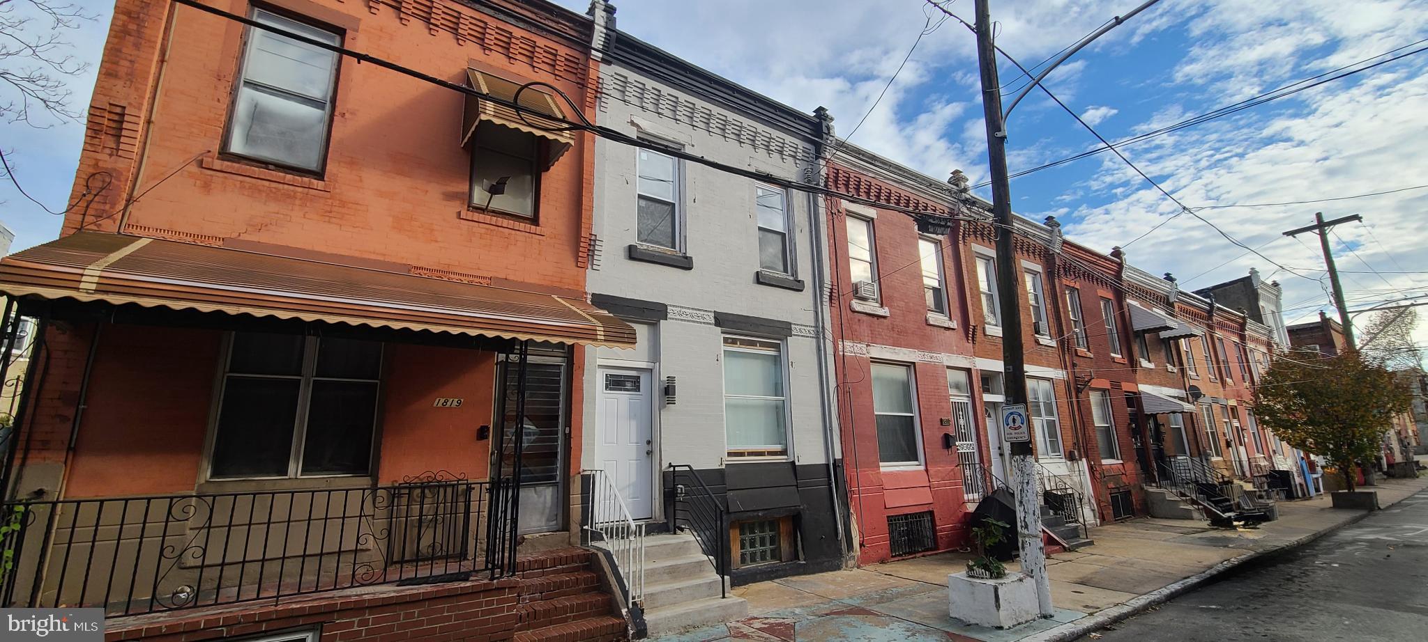 1817 North 26th Street Philadelphia, PA 19121 - Photo 2 of 25 a view of a building with many windows