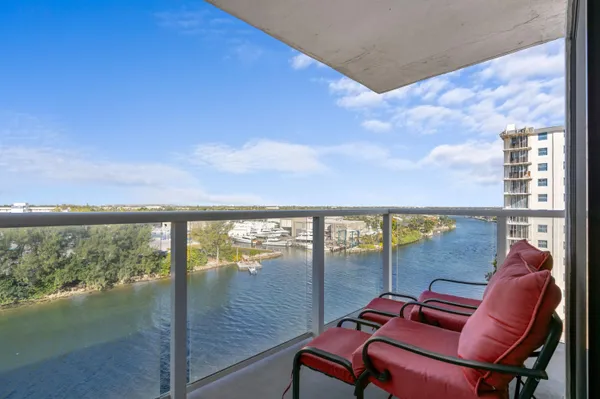 a view of a lake from a balcony