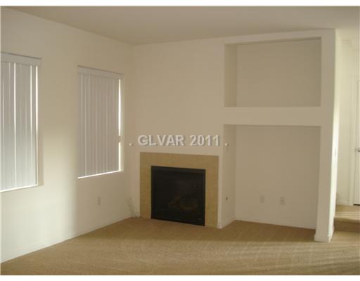 9313 Roping Cowboy Avenue Las Vegas, NV 89178 - Photo 7 of 22 Living Room.