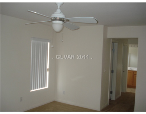 9313 Roping Cowboy Avenue Las Vegas, NV 89178 - Photo 8 of 22 Master Bedroom.