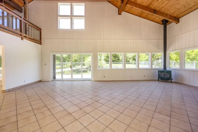 an empty room with windows