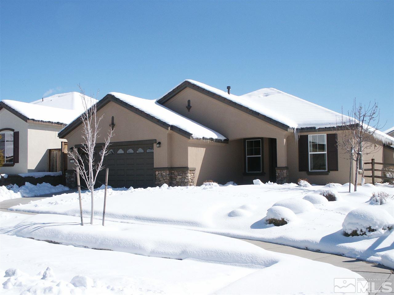 a view of a house with snow