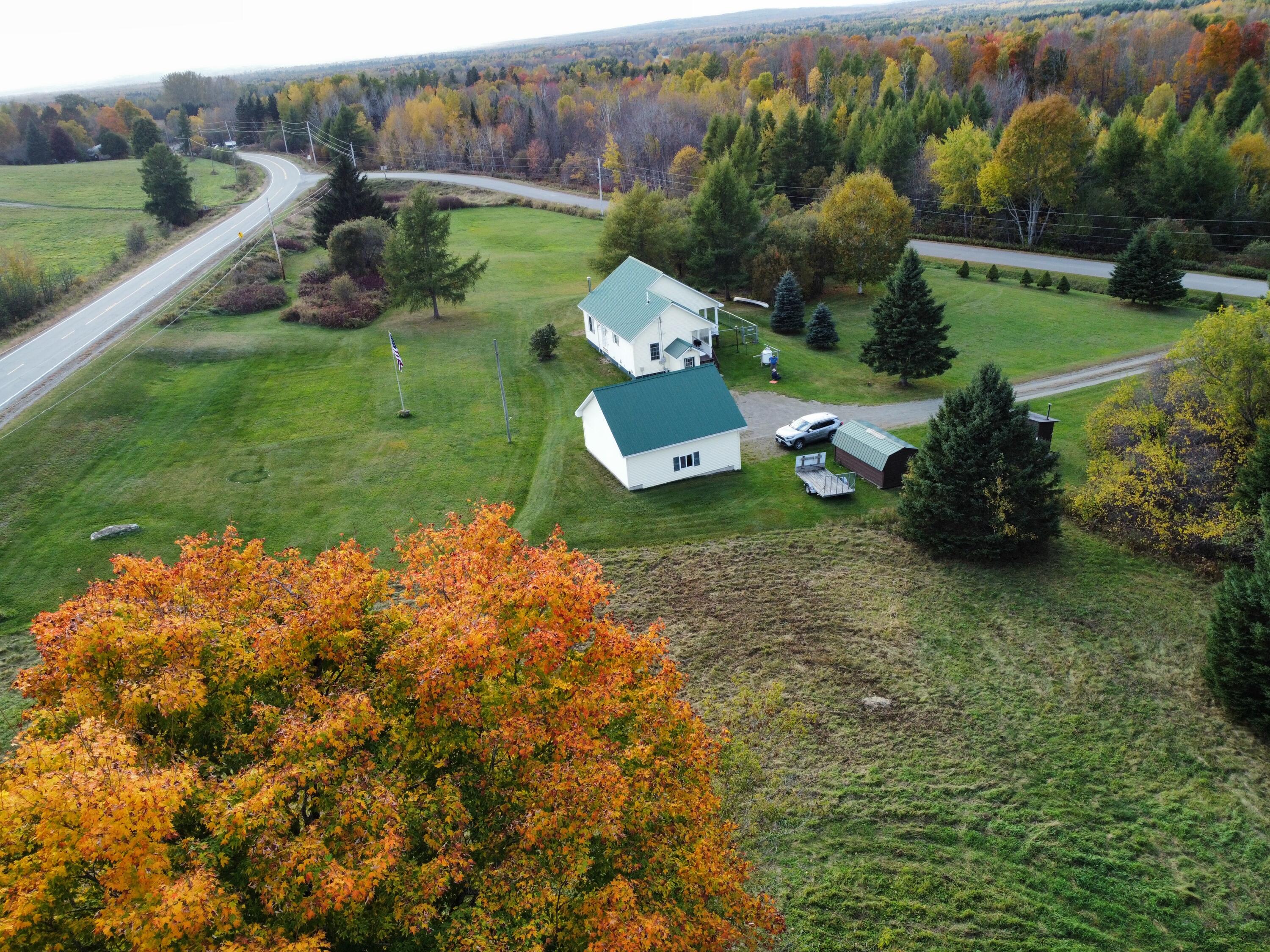 442 Old Patten Road Island Falls, ME 04747 - Photo 2 of 58 dji_fly_20241004_162302_339_172807377533