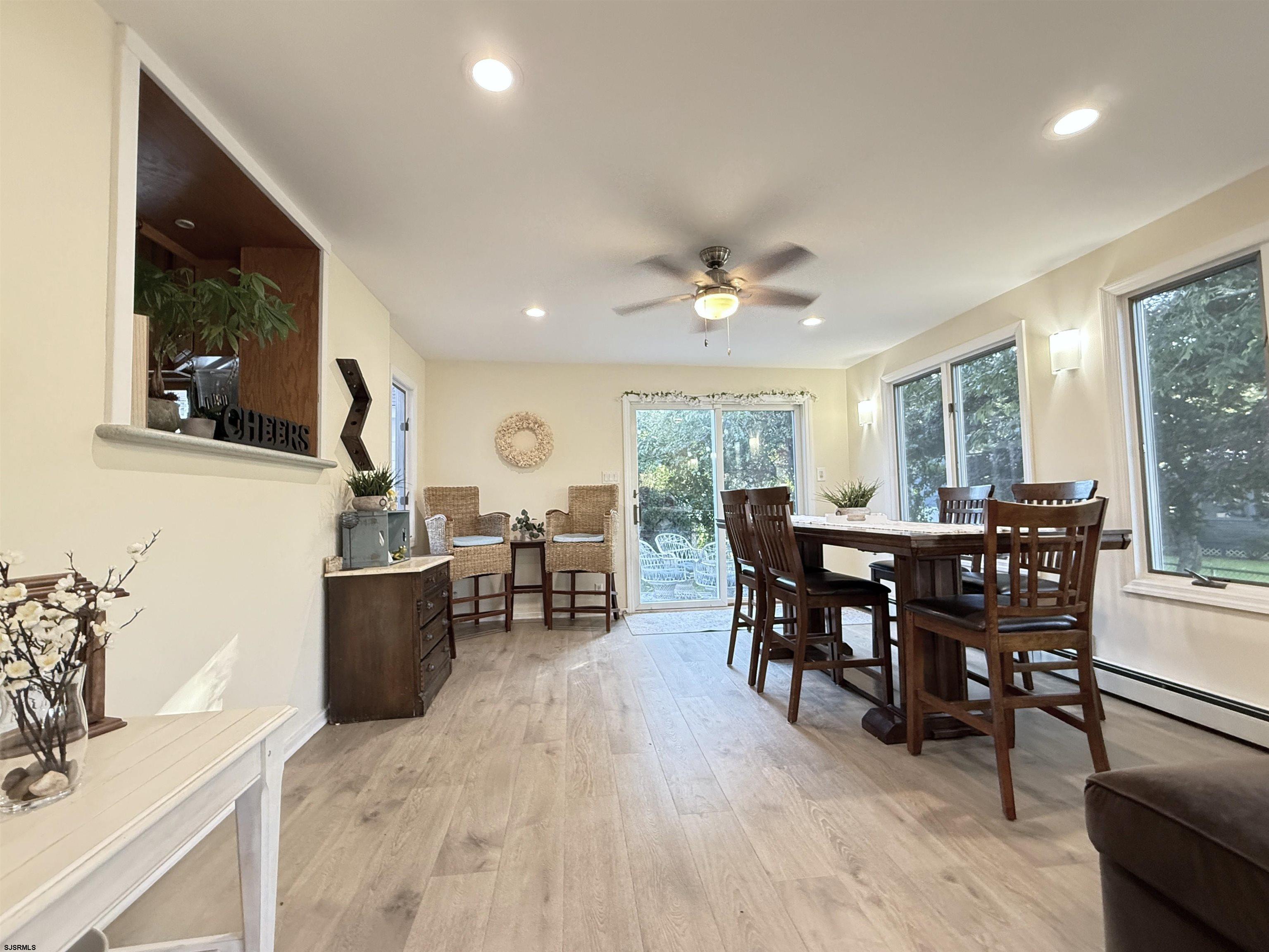 605 Shore Road Linwood, NJ 08221 - Photo 33 of 99 a view of a dining room with furniture and chandelier