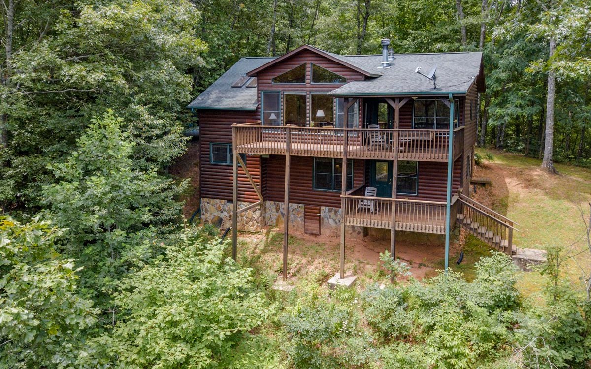 18 Bear Den Road Blue Ridge, GA 30513 - Photo 1 of 1 a house view with a garden space