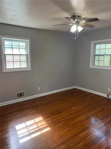 a view of a livingroom with a fan