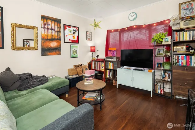 a living room with furniture and a flat screen tv