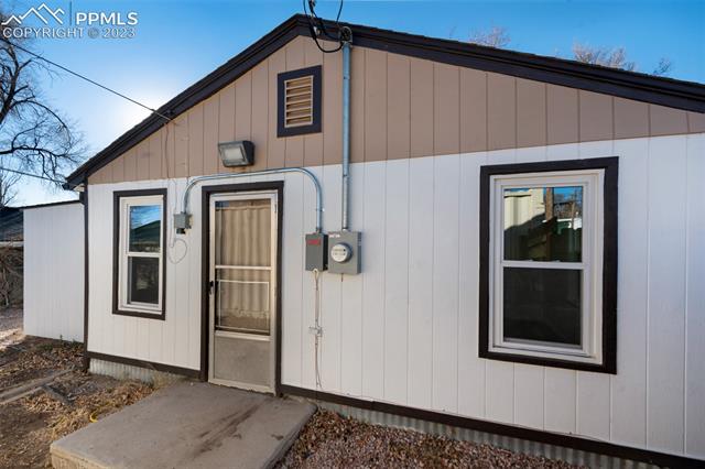 1007 Sunset Road Colorado Springs, CO 80909 - Photo 19 of 20 Back door
