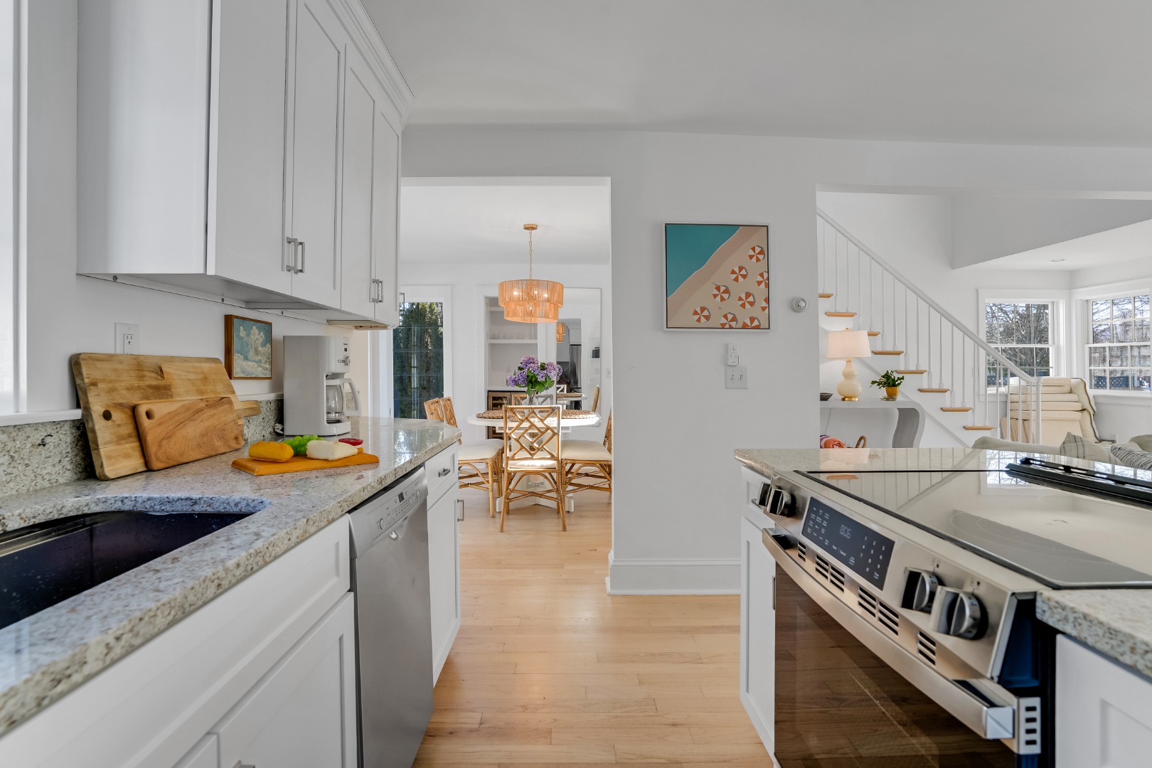 99 Cooke Street Edgartown, MA 02539 - Photo 11 of 26 a kitchen with stainless steel appliances granite countertop a stove a sink and a refrigerator