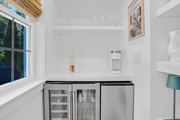 a bathroom with a bathtub and shower