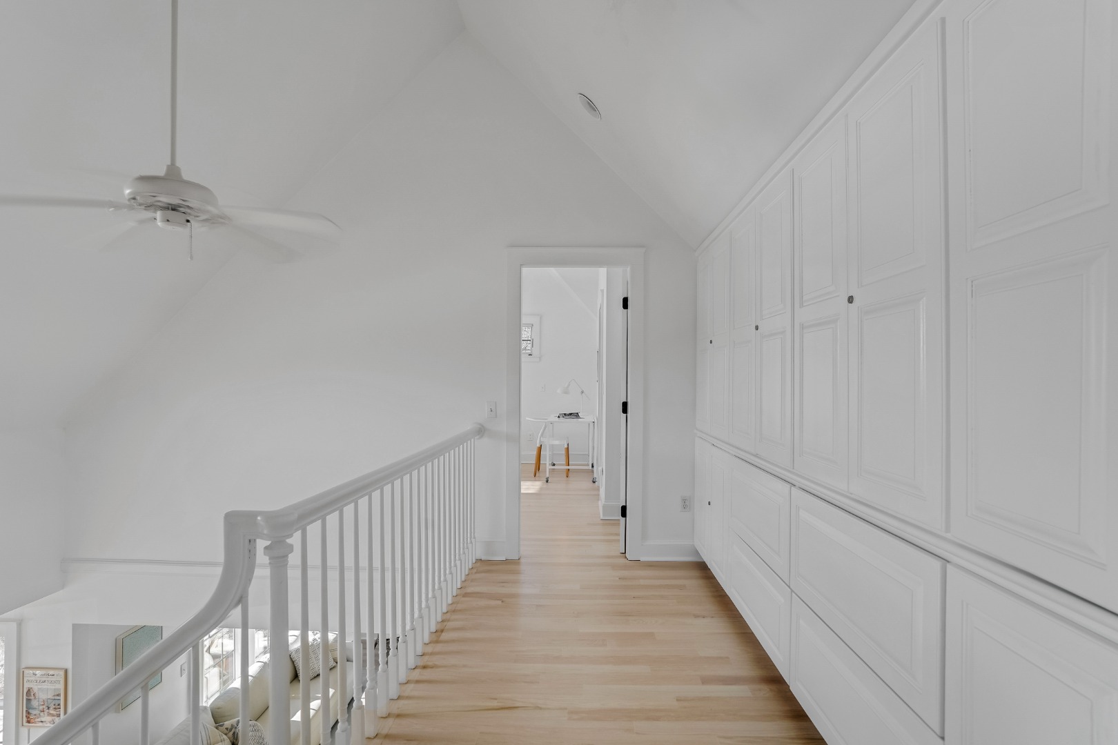 99 Cooke Street Edgartown, MA 02539 - Photo 22 of 26 a view of a hallway with wooden floor and staircase