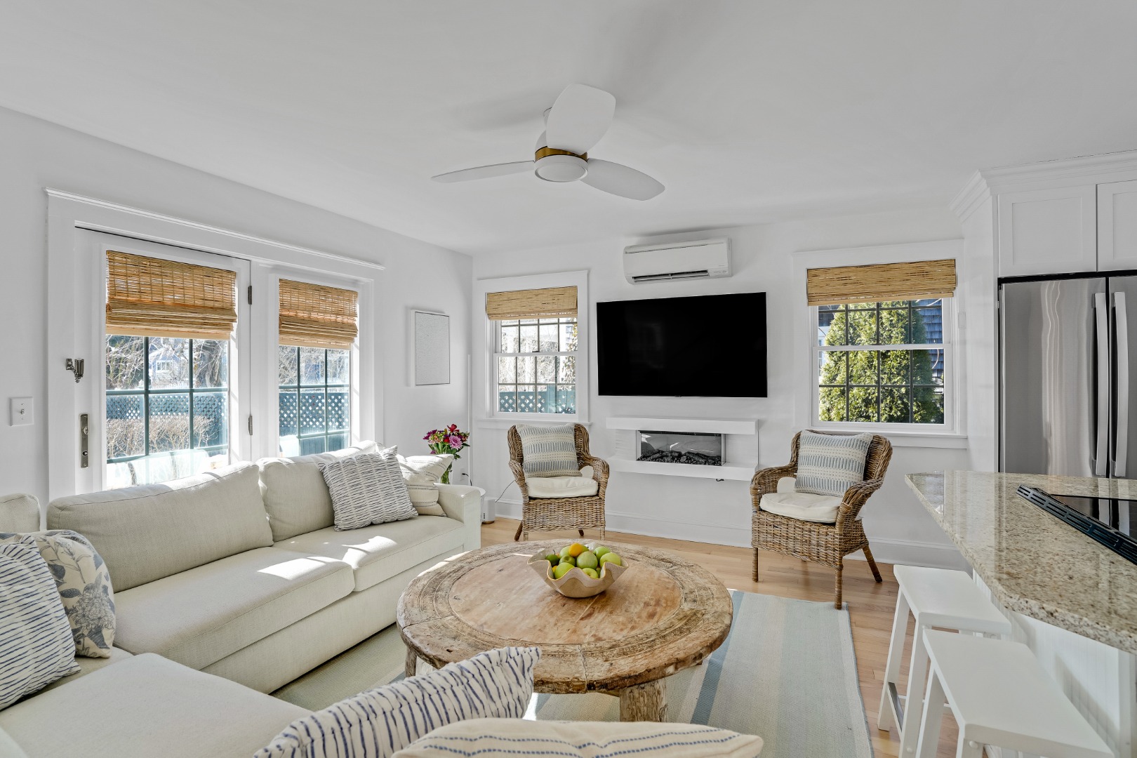 99 Cooke Street Edgartown, MA 02539 - Photo 5 of 26 a living room with furniture floor and a flat screen tv