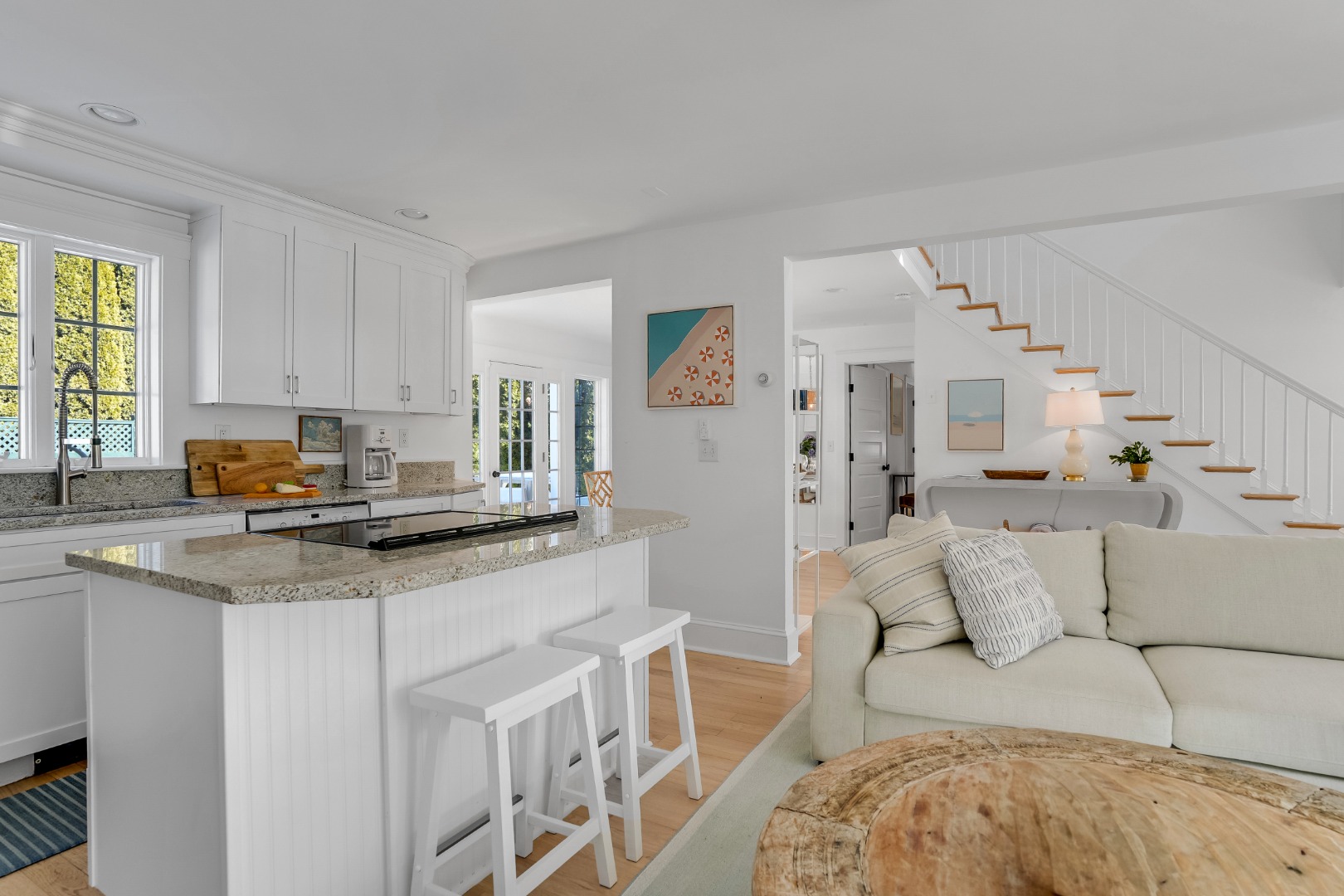 99 Cooke Street Edgartown, MA 02539 - Photo 8 of 26 a kitchen with stainless steel appliances granite countertop a stove a sink and a refrigerator
