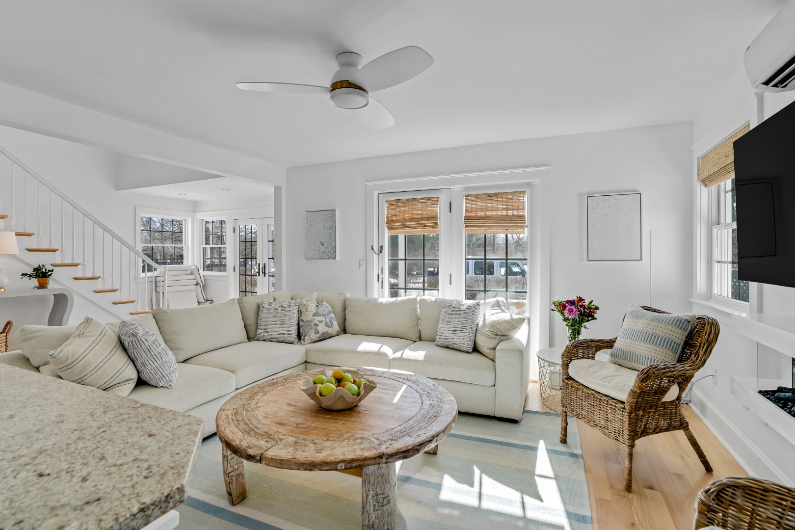 99 Cooke Street Edgartown, MA 02539 - Photo 10 of 26 a living room with furniture and a flat screen tv