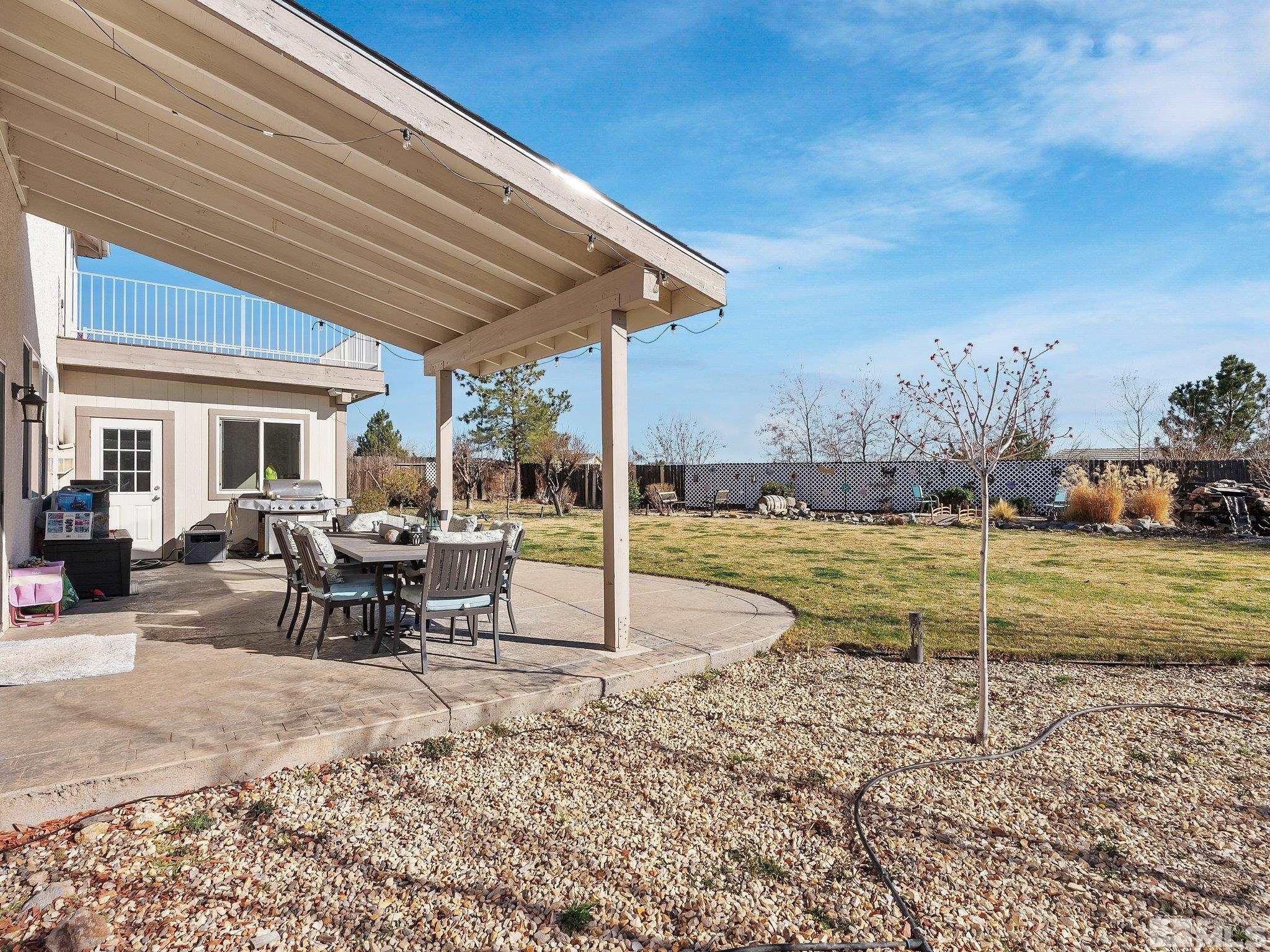 3451 Weaver Place Reno, NV 89512 - Photo 31 of 40 a view of a house with backyard and sitting area