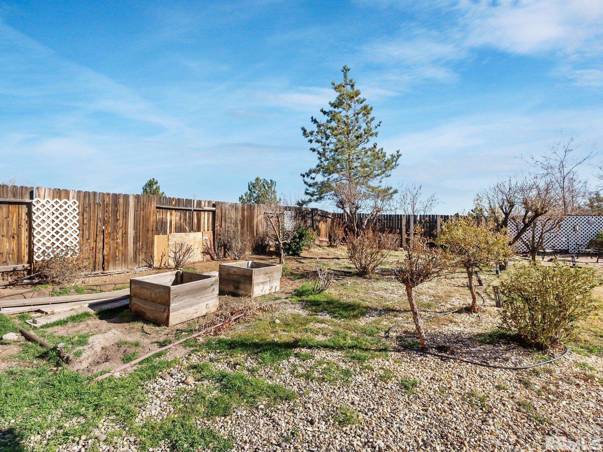 3451 Weaver Place Reno, NV 89512 - Photo 39 of 40 a view of swimming pool with outdoor seating and plants