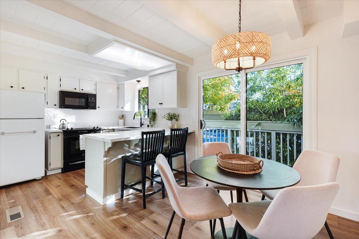 3003 Corte Cabrillo Aptos, CA 95003 - Photo 7 of 33 a view of a dining room with furniture window and outside view