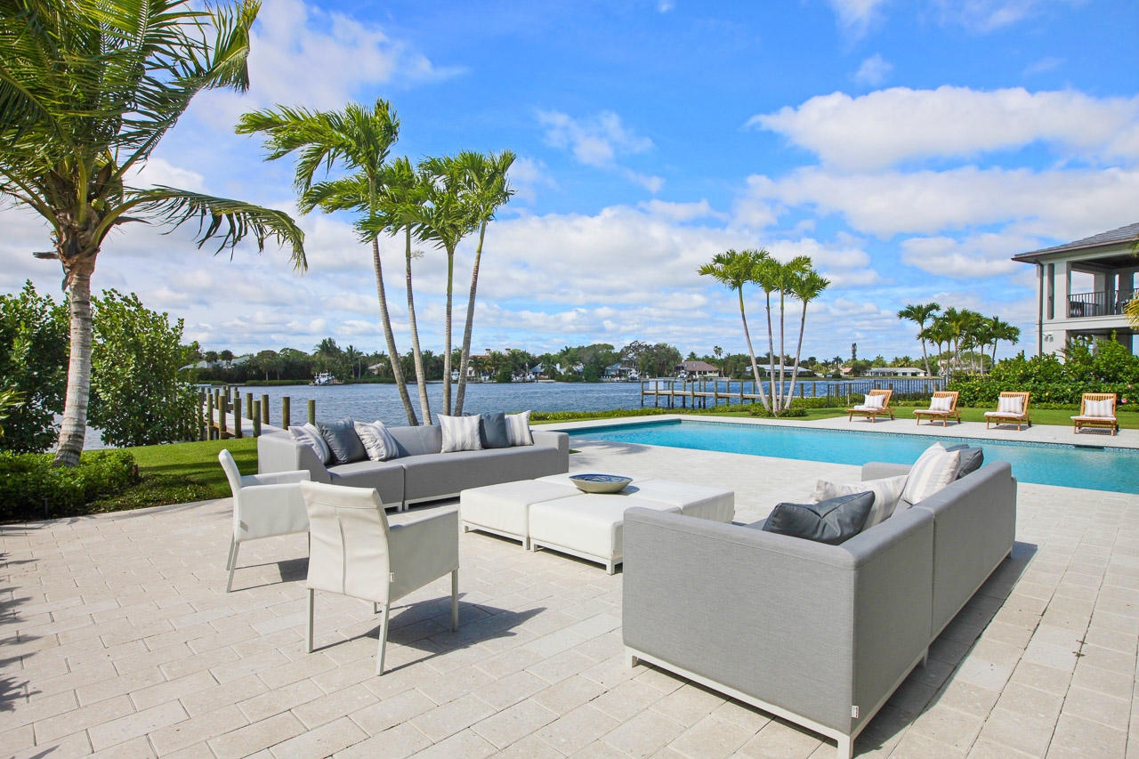 19659 North Riverside Drive Jupiter, FL 33469 - Photo 9 of 40 Large sitting area near pool.
