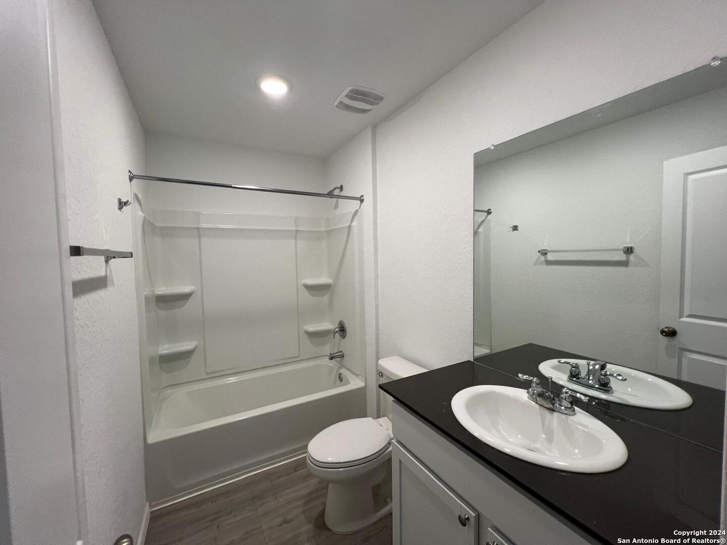 9928 Leeds Wheel San Antonio, TX 78254 - Photo 10 of 11 a bathroom with a sink toilet tub and shower