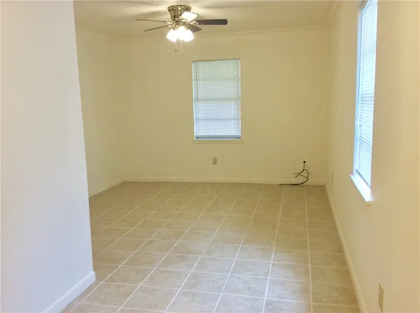 an empty room with a bathroom