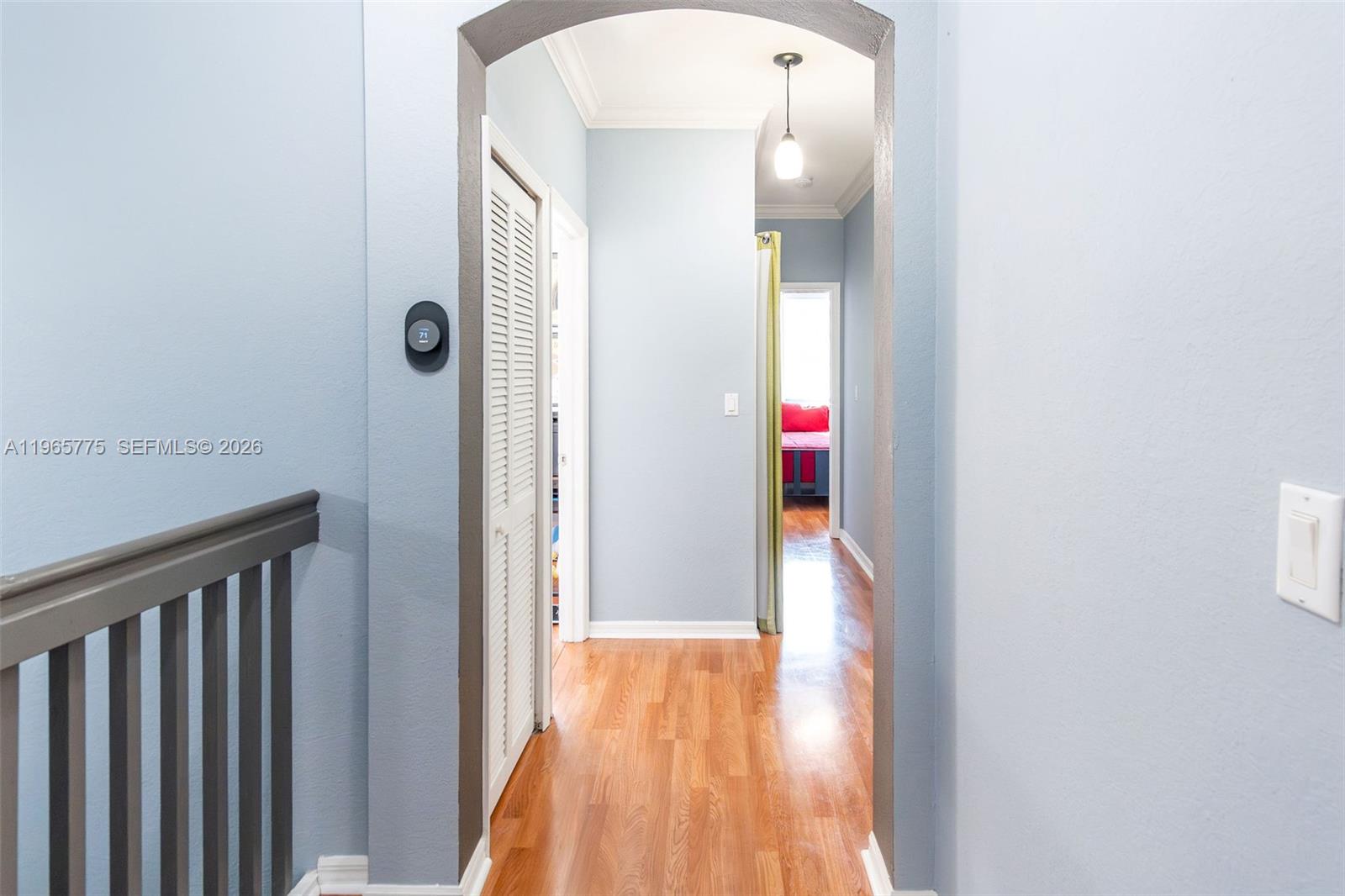 12523 Southwest 121st Way Miami, FL 33186 - Photo 26 of 56 a view of a bathroom from a hallway
