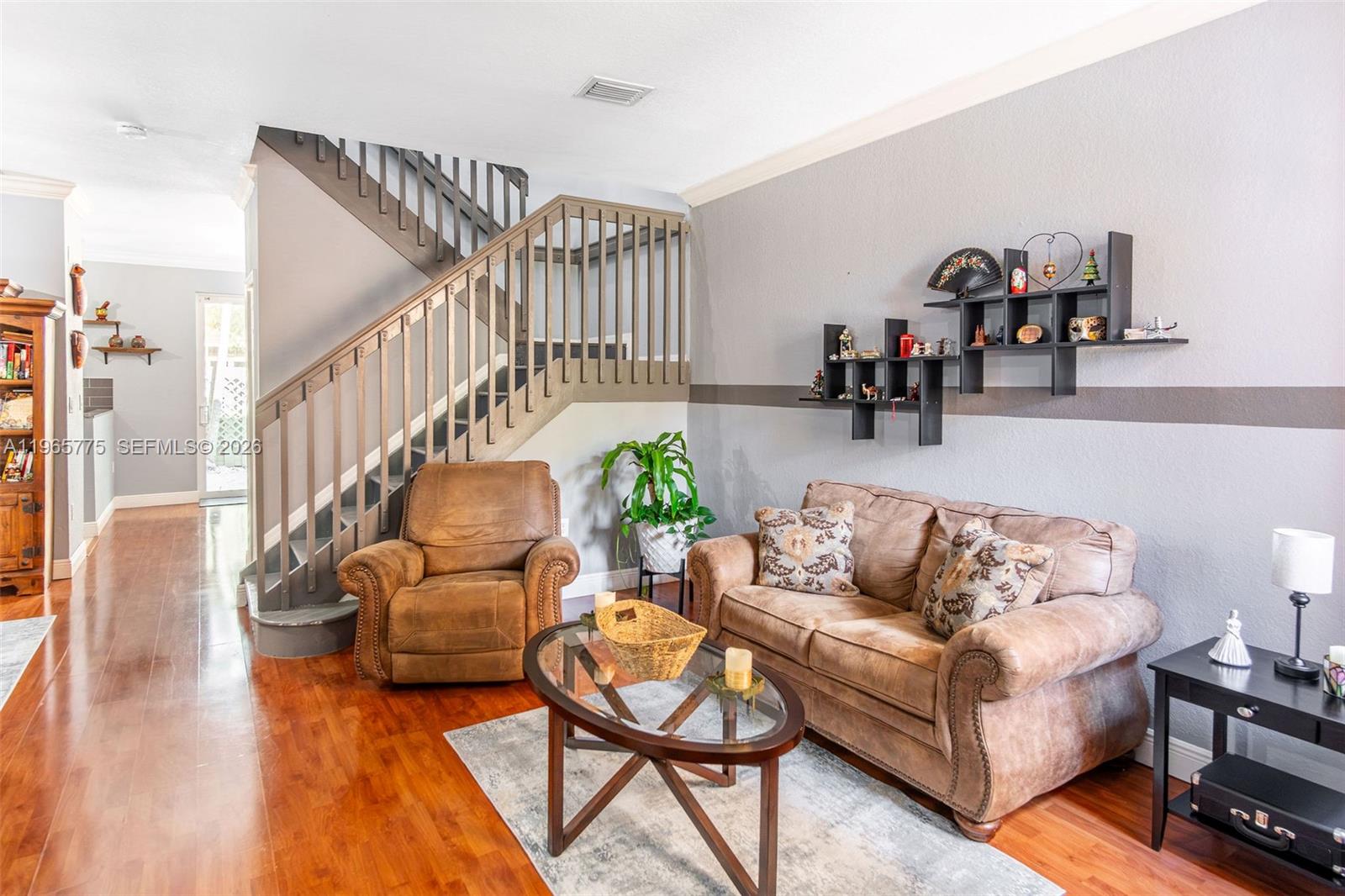 12523 Southwest 121st Way Miami, FL 33186 - Photo 3 of 56 a living room with furniture and wooden floor