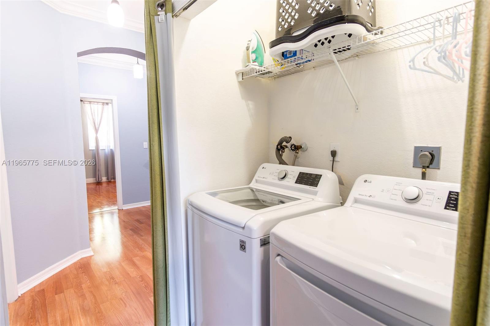 12523 Southwest 121st Way Miami, FL 33186 - Photo 34 of 56 a utility room with dryer and washer