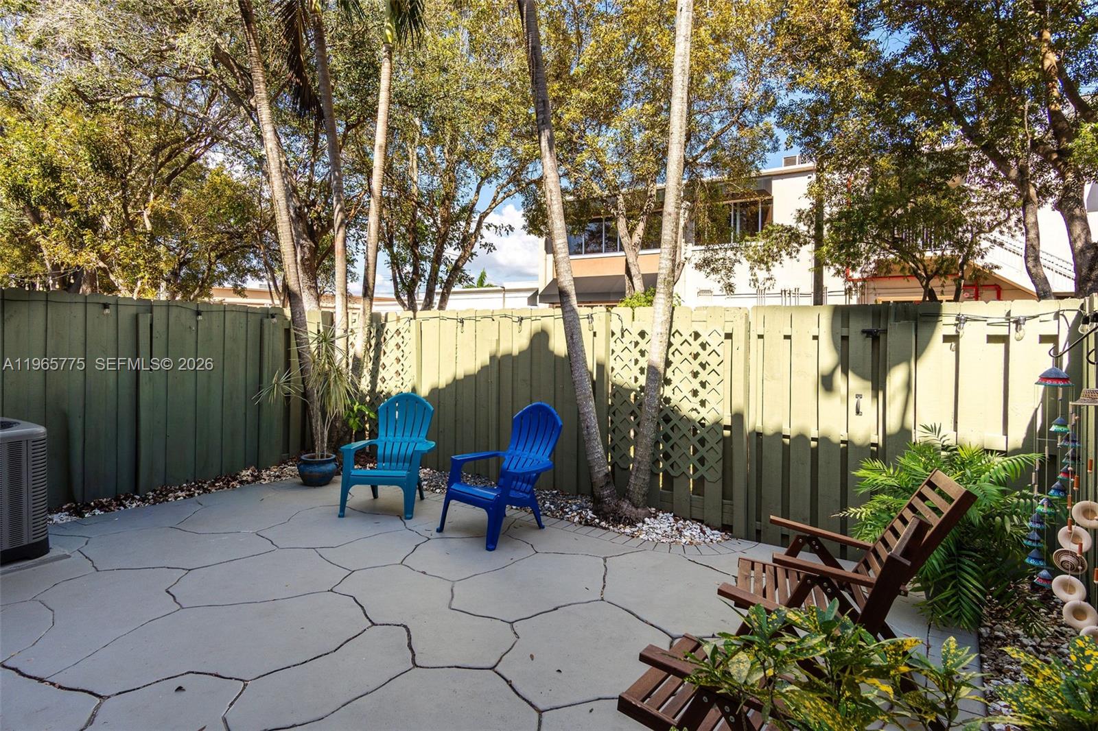 12523 Southwest 121st Way Miami, FL 33186 - Photo 49 of 56 a view of outdoor space with seating area and hardwood