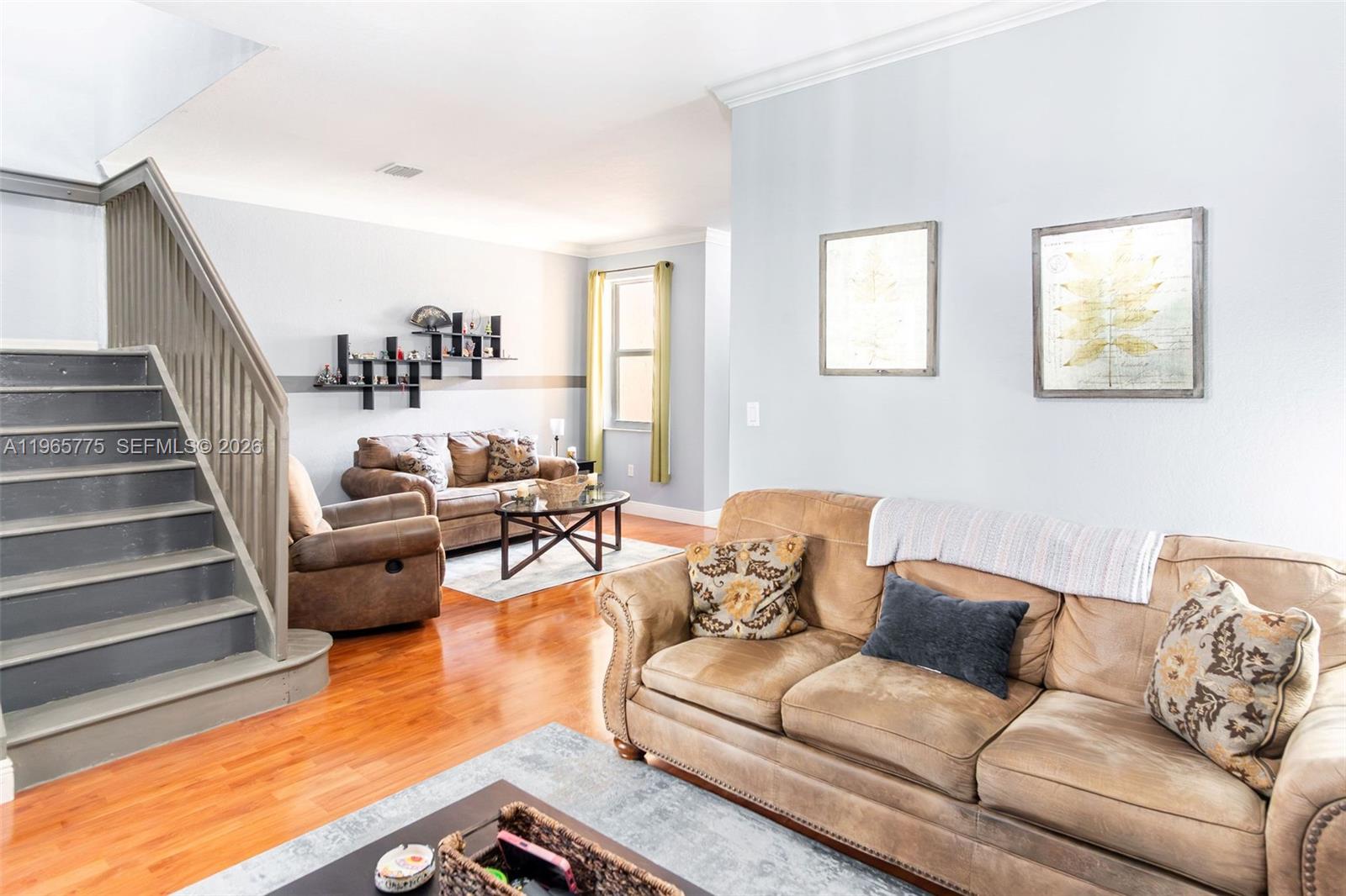 12523 Southwest 121st Way Miami, FL 33186 - Photo 5 of 56 a living room with furniture and a couch