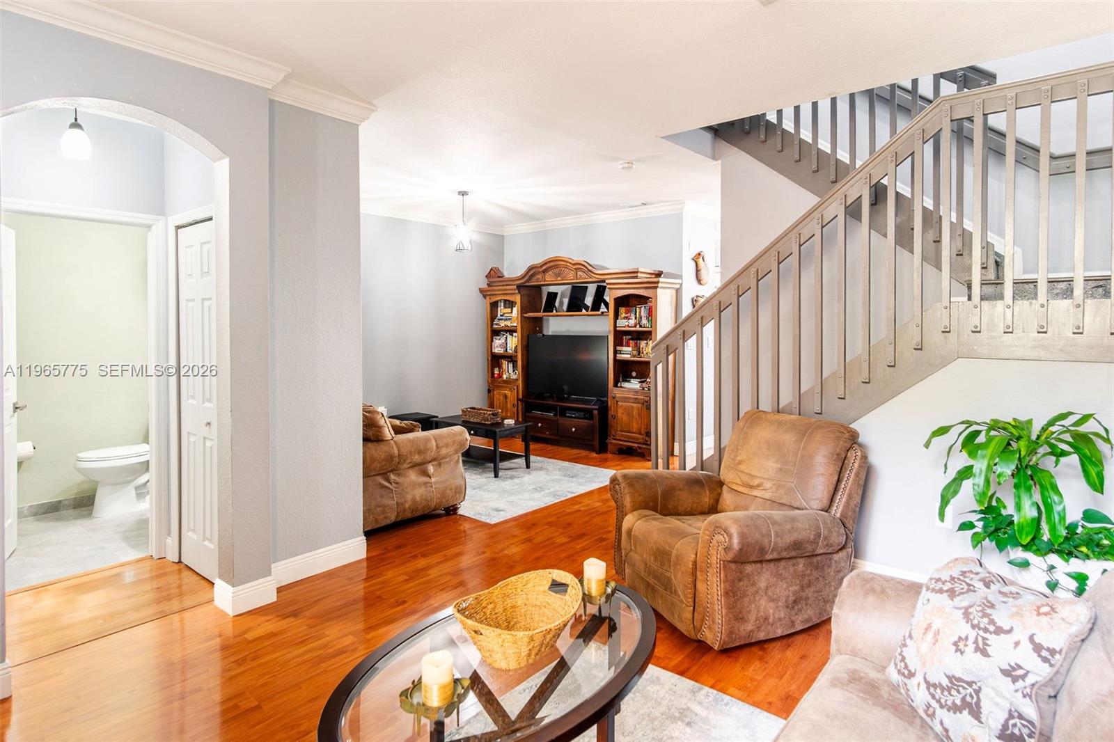 12523 Southwest 121st Way Miami, FL 33186 - Photo 8 of 56 a bedroom with furniture and a wooden floor