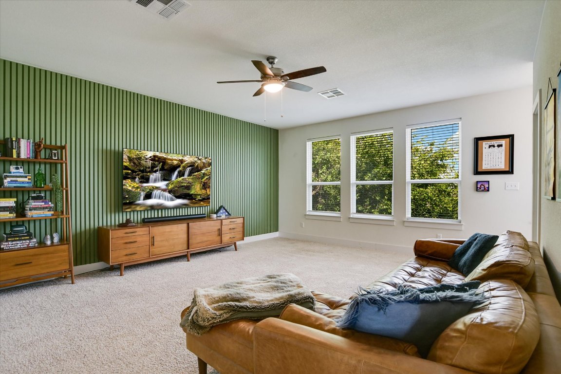92 Rancho Trail Georgetown, TX 78628 - Photo 11 of 27 a bedroom with furniture and window