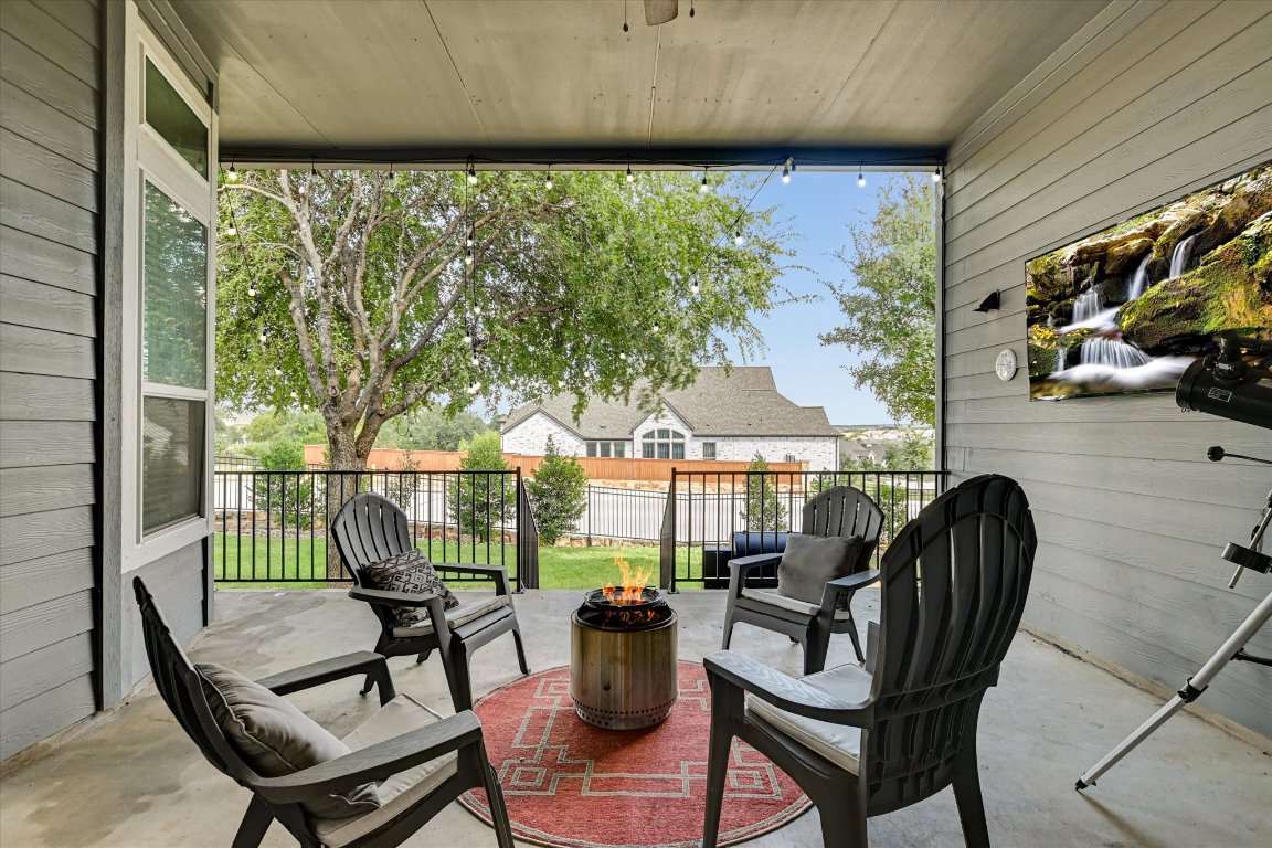 92 Rancho Trail Georgetown, TX 78628 - Photo 20 of 27 a view of a chairs and table in patio