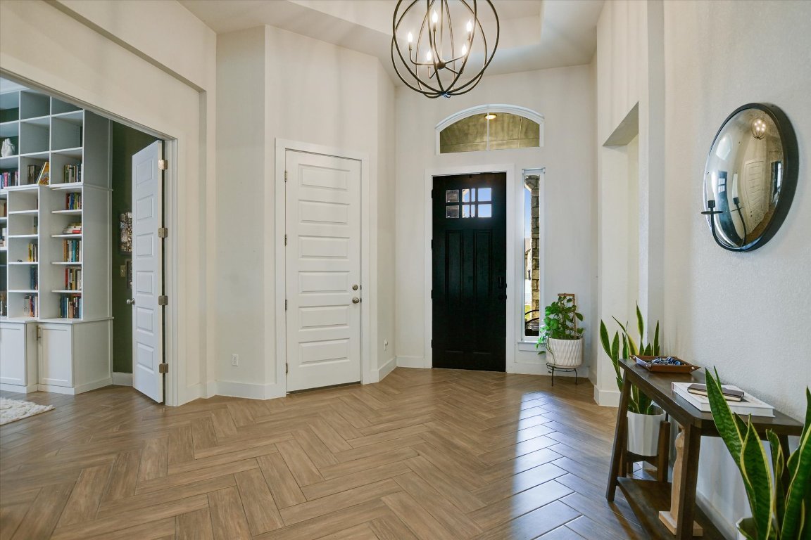 92 Rancho Trail Georgetown, TX 78628 - Photo 3 of 27 a view of a livingroom with furniture and wooden floor