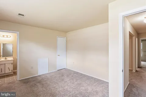 an empty room with closet